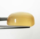 (bild för) Bra Pris Mycket Ovanlig Orange Kalcit 10,72 carat Oval Cabochon Vacker Färg från Afrika Köp Nu!