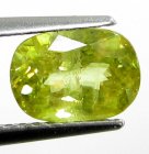 (bild för) Bra Pris Mycket Vacker Neon Gulgrön Sphene (Titianit) 1,68 carat Oval Slipad Mycket Fin Kvalitet & Lyster från Madagaskar Köp Nu!