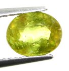 (bild för) Bra Pris Mycket Vacker Neon Gulgrön Sphene (Titianit) 1,44 carat Oval Slipad Mycket Fin Kvalitet & Lyster från Madagaskar Köp Nu!