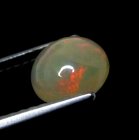 (bild för) Bra Pris Topp Lyster Etiopisk Opal 0,65 carat Rund Cabochon Slipning Mycket Fin Kvalitet Köp Nu!