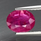 (bild för) Bra Pris Mycket Fin Rosaaktigt Röd Rubin 0,76 carat Oval Slipad Fin Lyster från Tanzania Köp Nu!