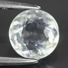 (bild för) Bra Pris Extremt Sällsynt Fosforcerande Färgväxlande Skapolit 0,76 carat Rund Slipning från Afganistan Köp Nu!