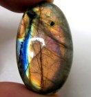 (bild för) Bra Pris Mycket Fin Kvalitet Regnbågs Lystrande Labradorit 53,44 carat Oval Cabochon Slipning Suverän Lyster & Färgspel från Madagaskar köp Nu!