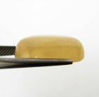 (bild för) Bra Pris Mycket Ovanlig Orange Kalcit 11,37 carat Oval Cabochon Vacker Färg från Afrika Köp Nu!