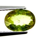 (bild för) Bra Pris Mycket Vacker Neon Gulgrön Sphene (Titianit) 1,25 carat Oval Slipad Mycket Fin Kvalitet & Lyster från Madagaskar Köp Nu!