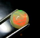(bild för) Bra Pris Topp Lyster Etiopisk Opal 0,71 carat Rund Cabochon Slipning Mycket Fin Kvalitet Köp Nu!