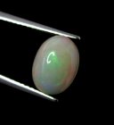 (bild för) Bra Pris Topp Lyster Etiopisk Opal 1,15 carat Oval Cabochon Slipning Mycket Fin Kvalitet Köp Nu!