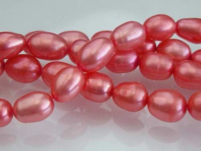 Orangeröd Sötvattenspärlor Ris 5-6 mm 52-54st 37-39cm/str.