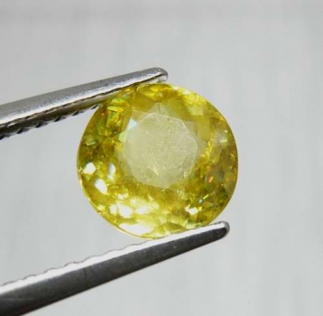 Bra Pris Topp Lyster Gulgrön Sphene (Titianit) 0,87 carat Rund Slipad Mycket Fin Kvalitet från Madagaskar Köp Nu!