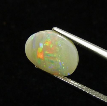 Bra Pris Lystrande Solid Opal 1,28 carat Fancy Cabochon från Australien Köp Nu!