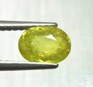 Bra Pris FIn Lyster Gulgrön Sphene (Titianit) 1,04 carat Oval Slipad Mycket Fin Kvalitet från Madagaskar Köp Nu!