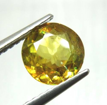 Bra Pris Topp Lyster Gulgrön Sphene (Titianit) 0,72 carat Rund Slipad Mycket Fin Kvalitet från Madagaskar Köp Nu!