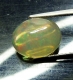 Bra Pris Topp Lyster Etiopisk Opal 1,68 carat Oval Cabochon Slipning Topp Kvalitet Köp Nu!