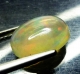 Bra Pris Topp Lyster Etiopisk Opal 1,68 carat Oval Cabochon Slipning Topp Kvalitet Köp Nu!