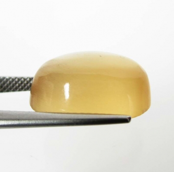 Bra Pris Mycket Ovanlig Orange Kalcit 10,72 carat Oval Cabochon Vacker Färg från Afrika Köp Nu!