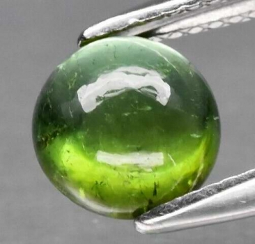 Bra Pris Certifierad Sällsynt Grön Turmalin Kattöga 2,18 carat Rund Cabochon Transparent Skarpt Öga från Mozambique Köp Nu!