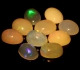 Bra Pris Parti 10 st Topp Lyster Etiopisk Opal 8,26 carat Oval Cabochon Slipning Mycket Fin Kvalitet Köp Nu!