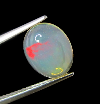 Bra Pris Topp Lyster Etiopisk Opal 1,50 carat Oval Cabochon Slipning Mycket Fin Kvalitet Köp Nu!