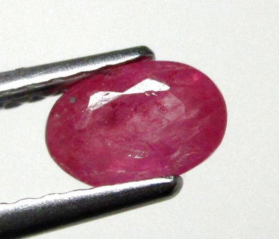 Good Price Very Nice Pinkish Red - Purple Red Ruby 0,61 carat Oval Cut Nice Luster & Price Worthy Quality from Madagascar Purchase Now!