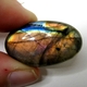Bra Pris Mycket Fin Kvalitet Regnbågs Lystrande Labradorit 53,44 carat Oval Cabochon Slipning Suverän Lyster & Färgspel från Madagaskar köp Nu!
