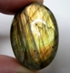 Bra Pris Mycket Fin Kvalitet Regnbågs Lystrande Labradorit 49,85 carat Oval Cabochon Slipning Suverän Lyster & Färgspel från Madagaskar köp Nu!