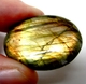 Bra Pris Mycket Fin Kvalitet Regnbågs Lystrande Labradorit 49,85 carat Oval Cabochon Slipning Suverän Lyster & Färgspel från Madagaskar köp Nu!