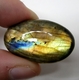 Bra Pris Mycket Fin Kvalitet Regnbågs Lystrande Labradorit 55,29 carat Oval Cabochon Slipning Suverän Lyster & Färgspel från Madagaskar köp Nu!