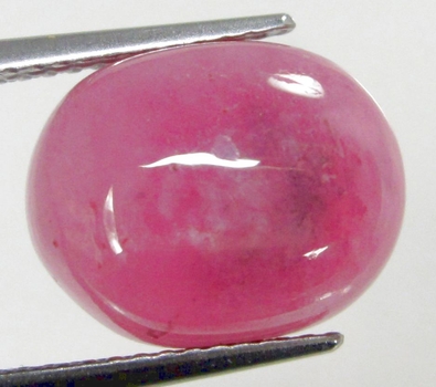 Bra Pris Mycket Fin Kvalitet Behandlad Rödrosa Rubin 8,26 carat Oval Slipad Cabochon från Madagaskar Köp Nu!