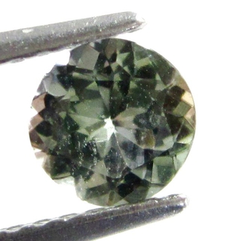 Bra Pris Mycket Sällsynt Vacker Violettaktigt Grön Zoisit 0,64 carat Rund Slipad Mycket Bra Lyster & Kvalitet från Tanzania Köp Nu!
