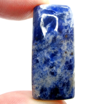 Bra Pris Mycket Fint Mönstrad Blå Sodalit 47,30 carat Kudd Cabochon Slipning Mycket Bra Kvalitet från Ryssland Köp Nu!