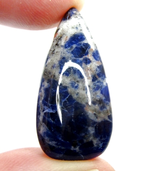Bra Pris Mycket Fint Mönstrad Blå Sodalit 32,09 carat Dropp Cabochon Slipning Mycket Bra Kvalitet från Ryssland Köp Nu!