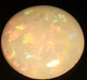 Bra Pris Mycket Fin Lystrande Opal 0,42 carat Rund Cabochon Bra Kvalitet från Coober Pedy Australien Köp Nu!