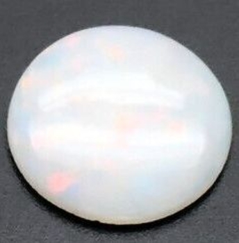 Bra Pris Mycket Fin Lystrande Opal 0,42 carat Rund Cabochon Bra Kvalitet från Coober Pedy Australien Köp Nu!