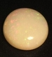 Bra Pris Mycket Fin Lystrande Opal 0,60 carat Rund Cabochon Bra Kvalitet från Coober Pedy Australien Köp Nu!