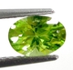 Bra Pris Mycket Fin Topp Grön Peridot 0,77 carat Oval Slipad Mycket Fin Lyster & Kvalitet från Pakistan Köp Nu!