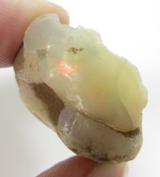 Bra Pris Mycket Stor Sällsynt Rå Oslipad Lystrande Somalisk Opal 95,86 carat Naturlig Kristall Mycket Fin Kvalitet & Färg Sprakande Köp Nu!