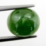 Bra Pris Fin Kvalitet Mycket Sällsynt Grön Demantoid Granat 5,30 carat Oval Cabochon Slipad Fin Färg & Lyster från Afrika Köp Nu!