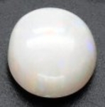 Bra Pris Mycket Fin Lystrande Opal 0,79 carat Rund Cabochon Bra Kvalitet från Coober Pedy Australien Köp Nu!