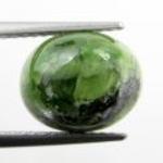 Bra Pris Fin Kvalitet Mycket Sällsynt Grön Demantoid Granat 4,74 carat Oval Cabochon Slipad Fin Färg & Lyster från Afrika Köp Nu!