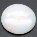 Bra Pris Mycket Fin Lystrande Opal 0,42 carat Rund Cabochon Bra Kvalitet från Coober Pedy Australien Köp Nu!