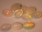 Bra Pris Parti 10 st Topp Lyster Etiopisk Opal 8,09 carat Oval Cabochon Slipning Mycket Fin Kvalitet Köp Nu!
