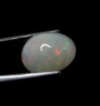 Bra Pris Topp Lyster Etiopisk Opal 1,58 carat Oval Cabochon Slipning Mycket Fin Kvalitet Köp Nu!