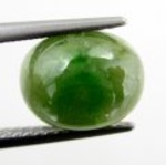 Bra Pris Fin Kvalitet Mycket Sällsynt Grön Demantoid Granat 3,94 carat Oval Cabochon Slipad Fin Färg & Lyster från Afrika Köp Nu!