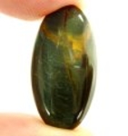 Good Price Very Nice Lusterous Bluish or Brownish Hawk´s Eye 20,04 carat Oval Cabochon Very Good Quality & Colour´s Pattern from South Africa Purchase Now!