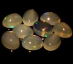 Bra Pris Parti 9 st Topp Lyster Etiopisk Opal 7,37 carat Oval Cabochon Slipning Transparant Mycket Fin Kvalitet Köp Nu!