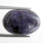 Bra Pris Mycket Sällsynt Vackert Lila Mönstrad Charoit 12,58 carat Oval Cabochon från Sibirien Ryssland Köp Nu!